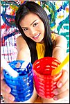 Thai Girls Holding Paint Pots Smiling Broadly